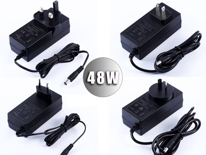 Interchangeable Plug Adapter EU/Us/UK/Au/Cn Standard 9V 2A Power Supply